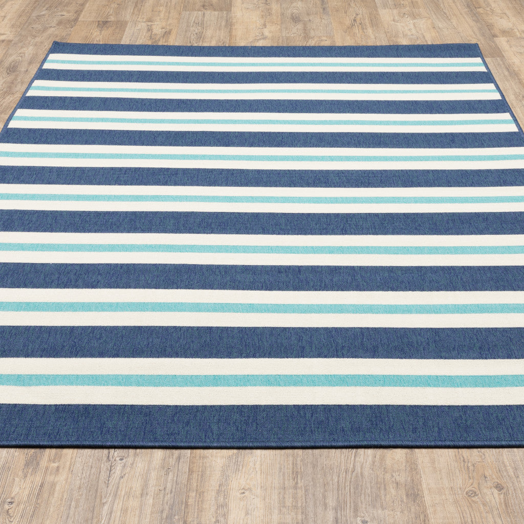 7' x 10' Blue and Ivory Geometric Stain Resistant Indoor Outdoor Area Rug