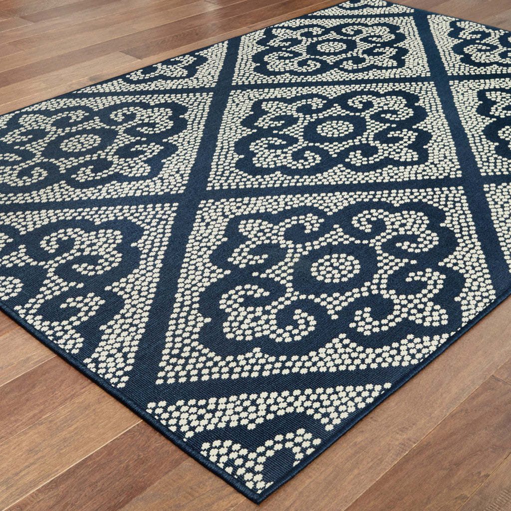 5' x 8' Blue and Ivory Geometric Stain Resistant Indoor Outdoor Area Rug