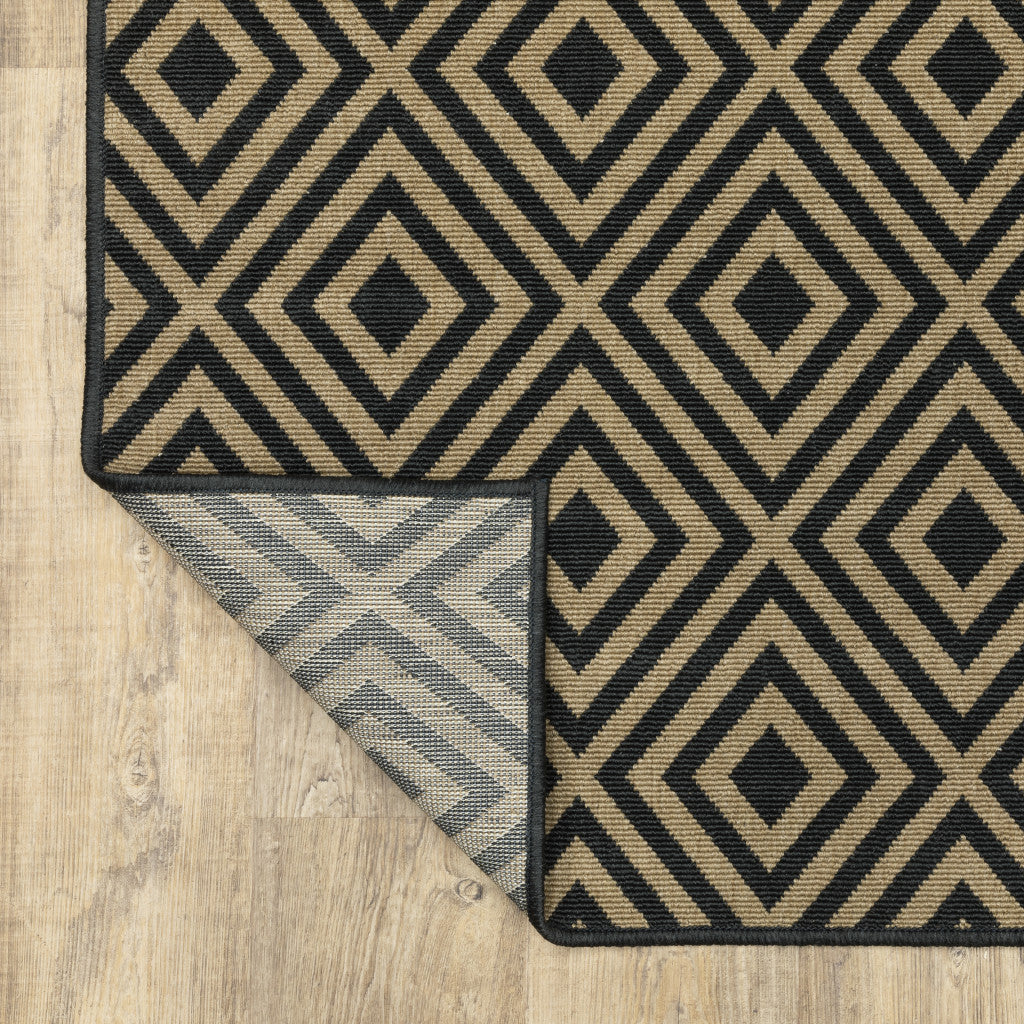 4' x 6' Black and Tan Geometric Stain Resistant Indoor Outdoor Area Rug