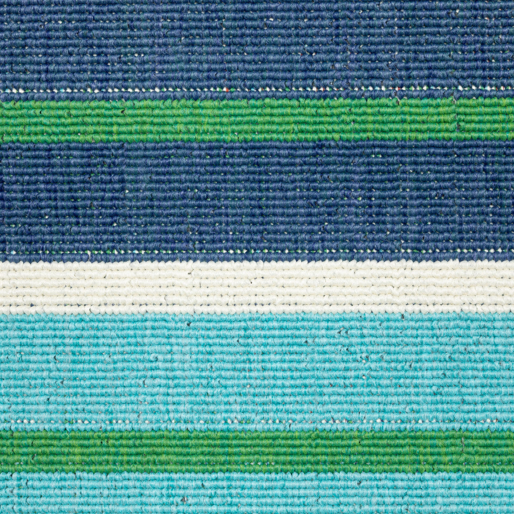 7' x 10' Blue and Green Geometric Stain Resistant Indoor Outdoor Area Rug