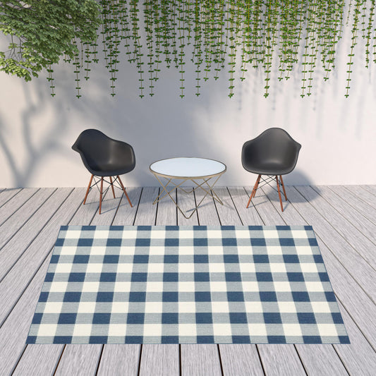 8' x 11' Blue and Ivory Geometric Stain Resistant Indoor Outdoor Area Rug