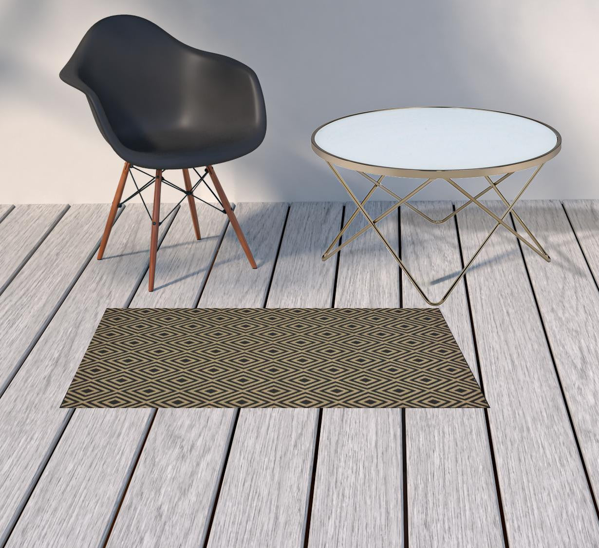 2' X 4' Black and Tan Geometric Stain Resistant Indoor Outdoor Area Rug