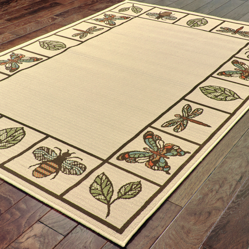 2' X 4' Brown and Ivory Abstract Stain Resistant Indoor Outdoor Area Rug