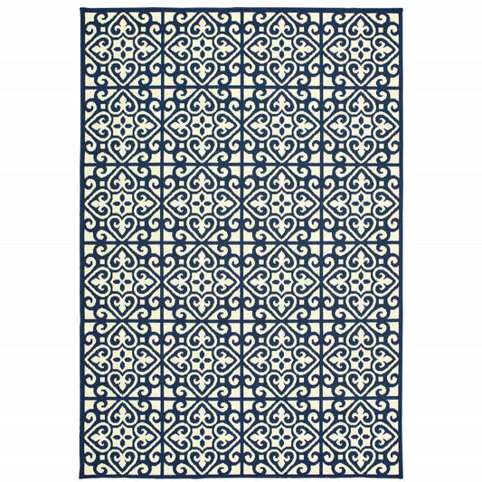 5' x 8' Ivory and Blue Geometric Stain Resistant Indoor Outdoor Area Rug