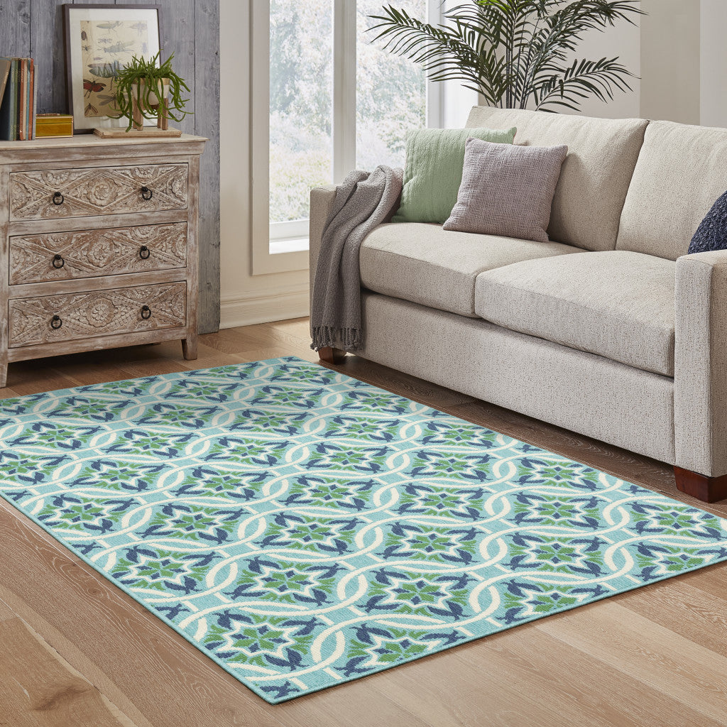 7' x 10' Blue and Green Geometric Stain Resistant Indoor Outdoor Area Rug