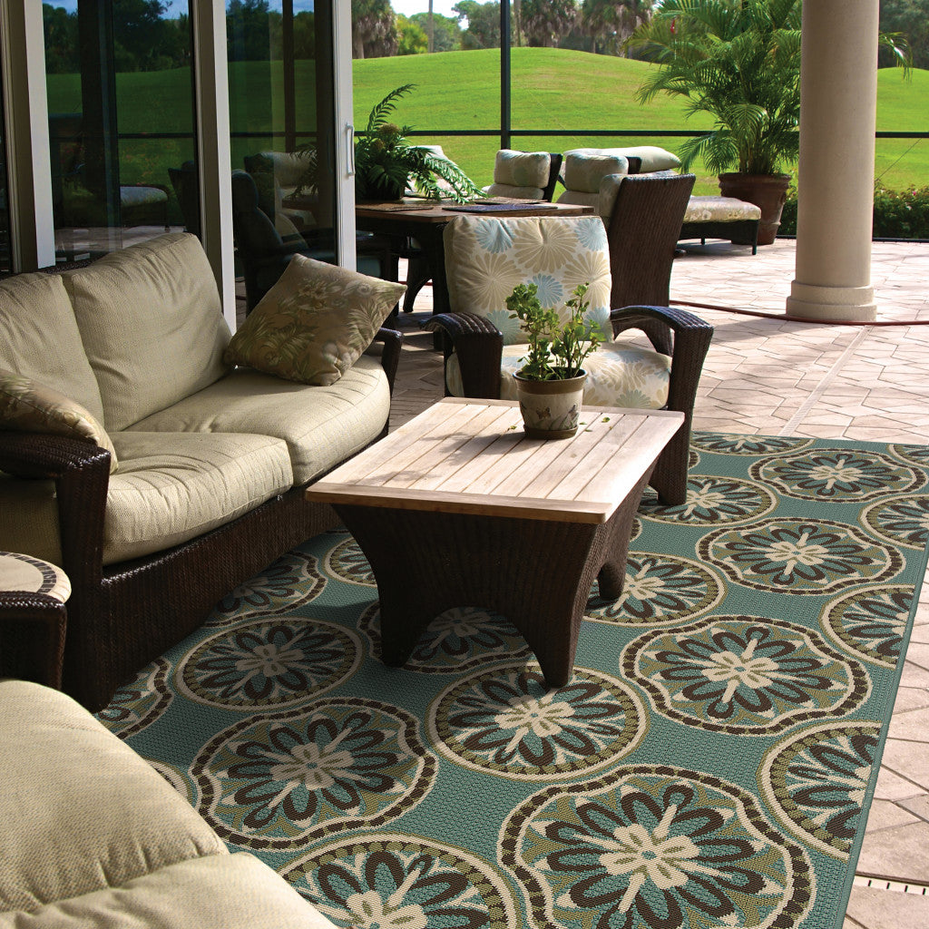 8' x 11' Blue and Ivory Floral Stain Resistant Indoor Outdoor Area Rug