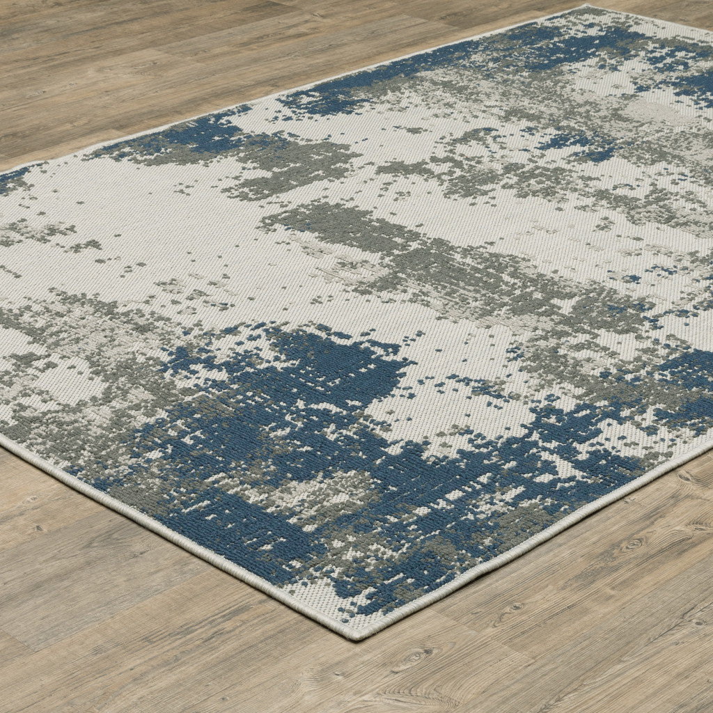 2' X 4' Blue and Beige Abstract Stain Resistant Indoor Outdoor Area Rug