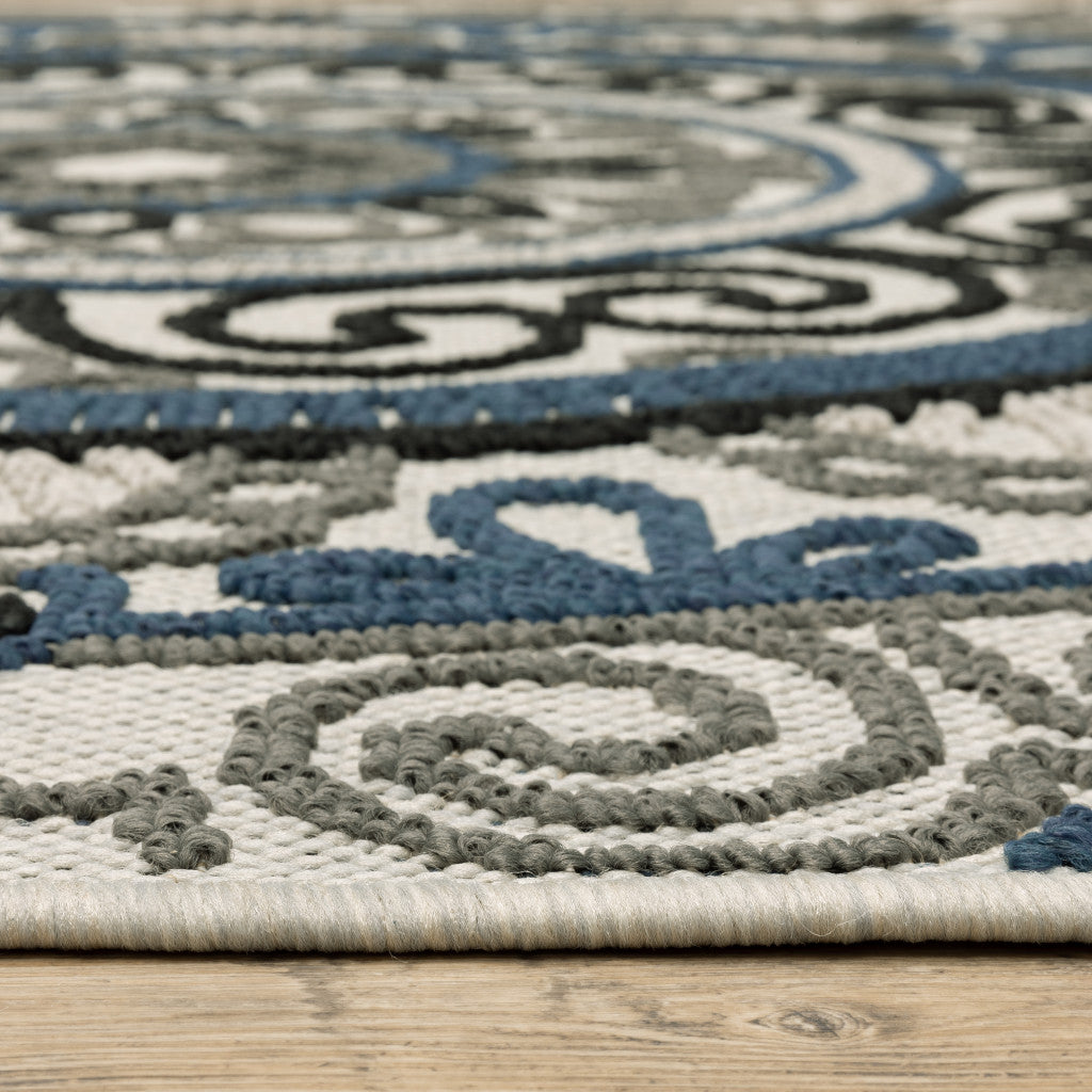 5' x 7' Blue and Beige Geometric Stain Resistant Indoor Outdoor Area Rug