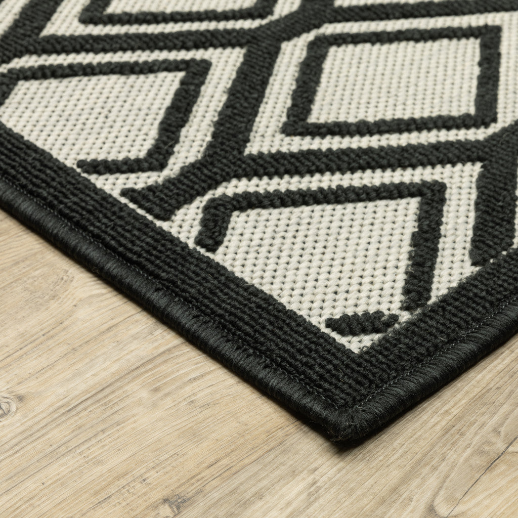 8' x 10' Beige and Black Geometric Stain Resistant Indoor Outdoor Area Rug