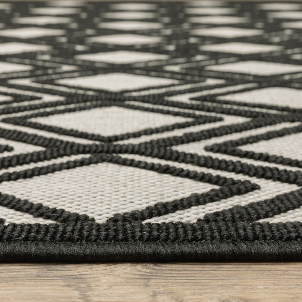 8' x 10' Beige and Black Geometric Stain Resistant Indoor Outdoor Area Rug