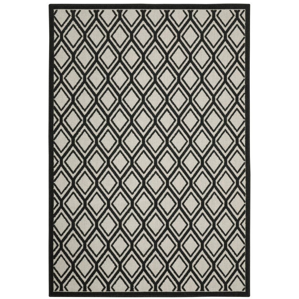 8' x 10' Beige and Black Geometric Stain Resistant Indoor Outdoor Area Rug