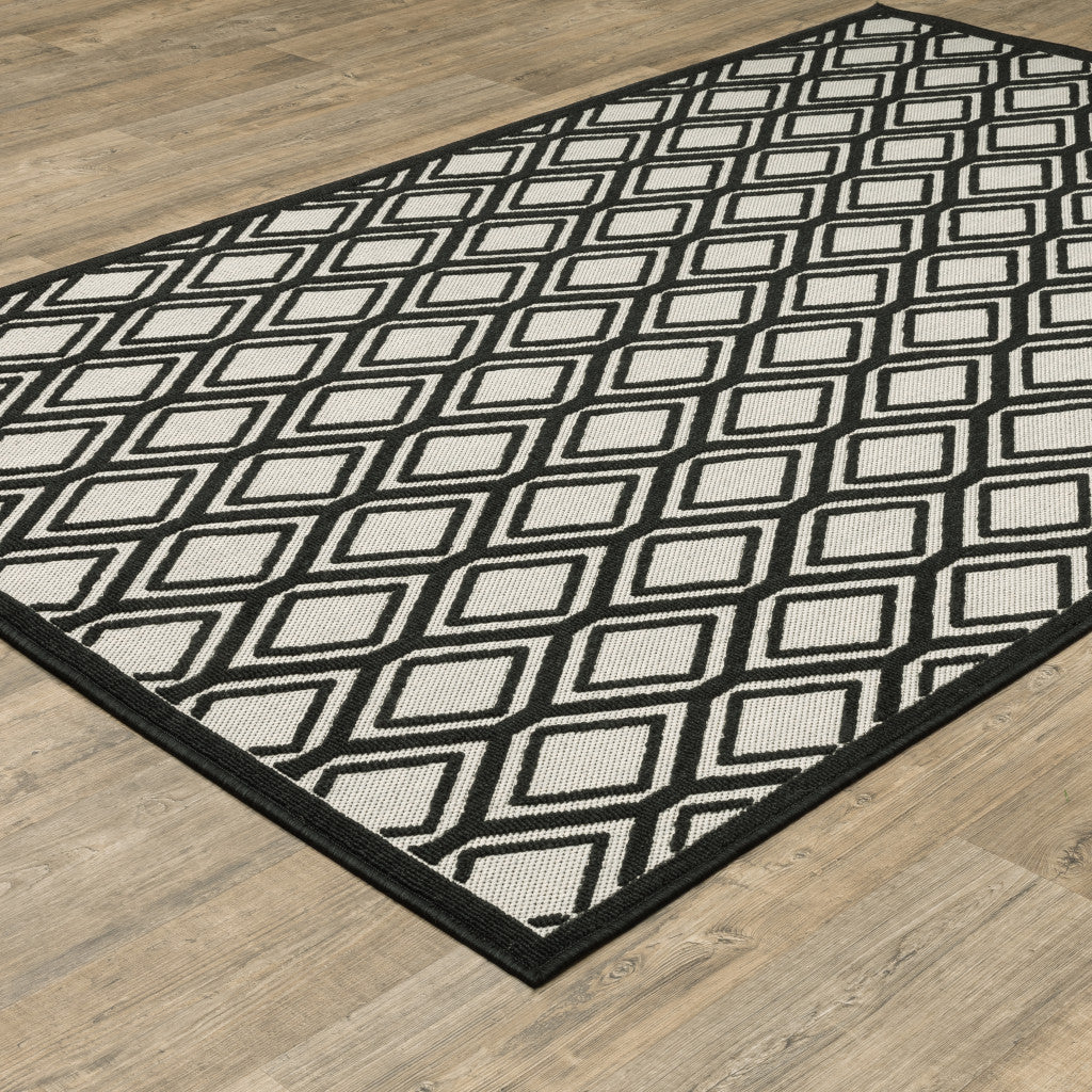 8' x 10' Beige and Black Geometric Stain Resistant Indoor Outdoor Area Rug