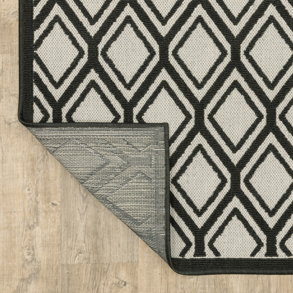 8' x 10' Beige and Black Geometric Stain Resistant Indoor Outdoor Area Rug