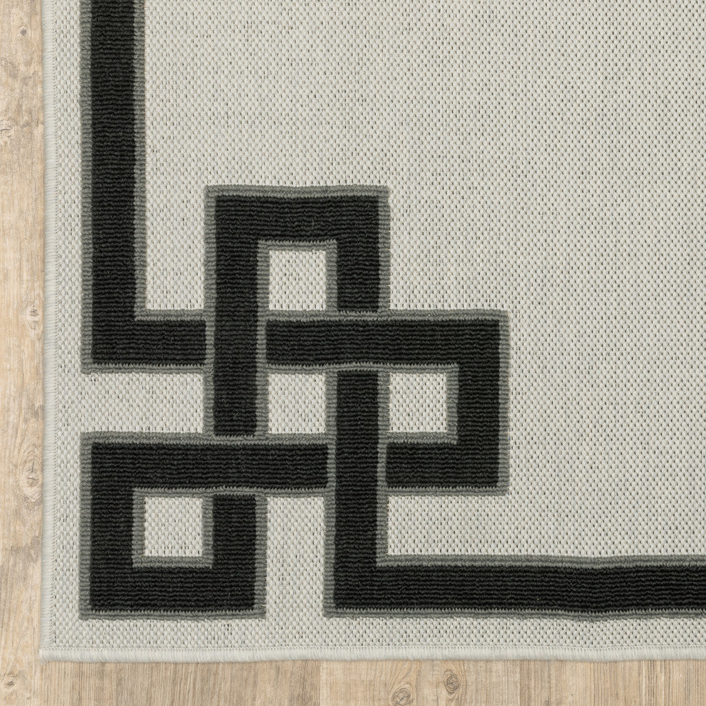 3' X 5' Beige and Black Stain Resistant Indoor Outdoor Area Rug