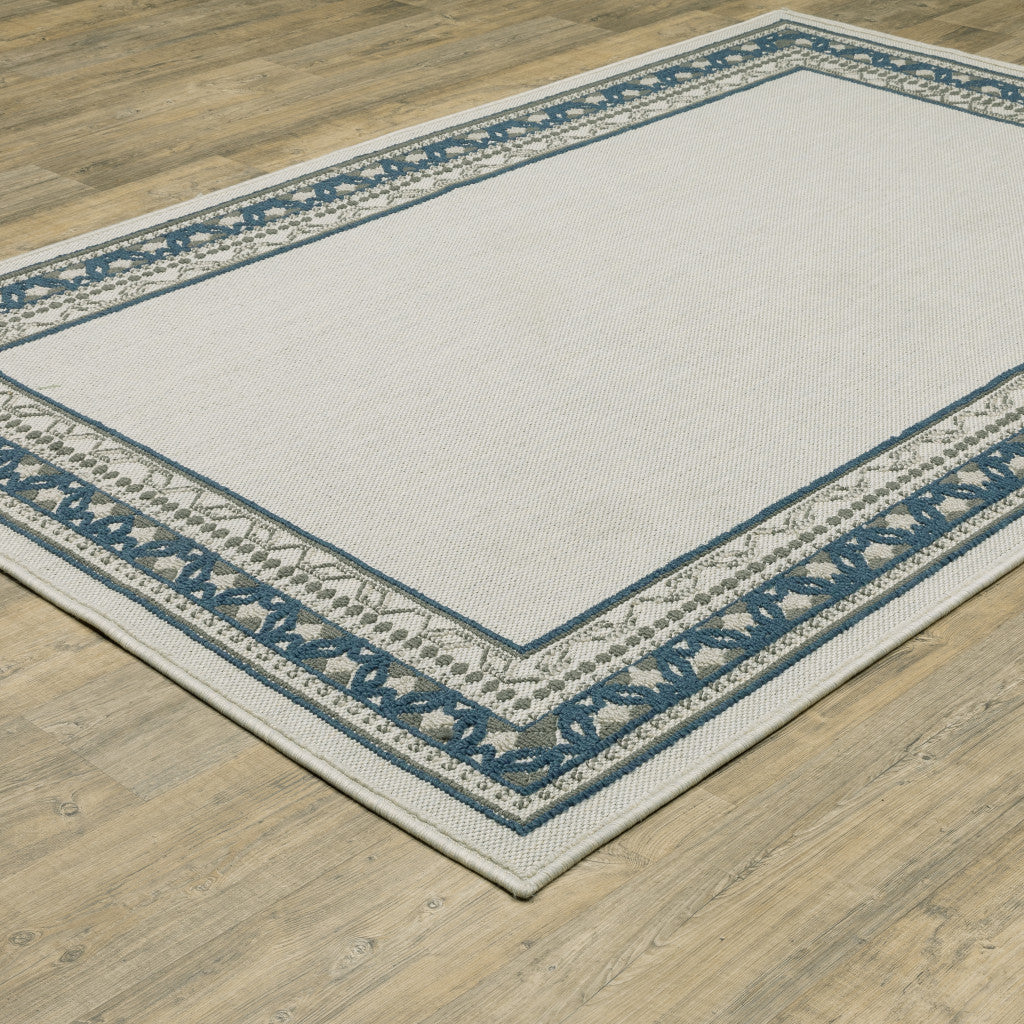 5' x 7' Blue and Beige Stain Resistant Indoor Outdoor Area Rug