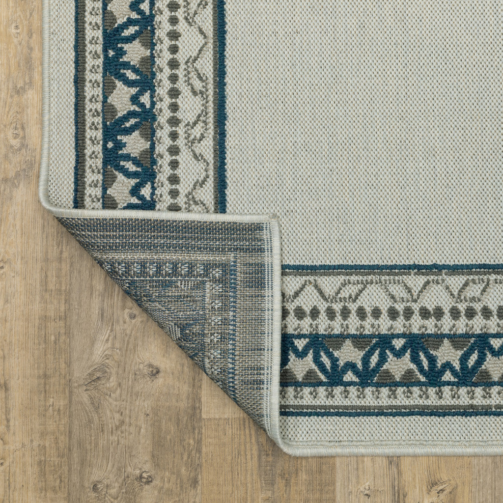 5' x 7' Blue and Beige Stain Resistant Indoor Outdoor Area Rug