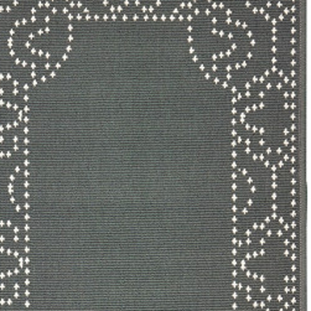 2' X 8' Gray and Ivory Stain Resistant Indoor Outdoor Area Rug