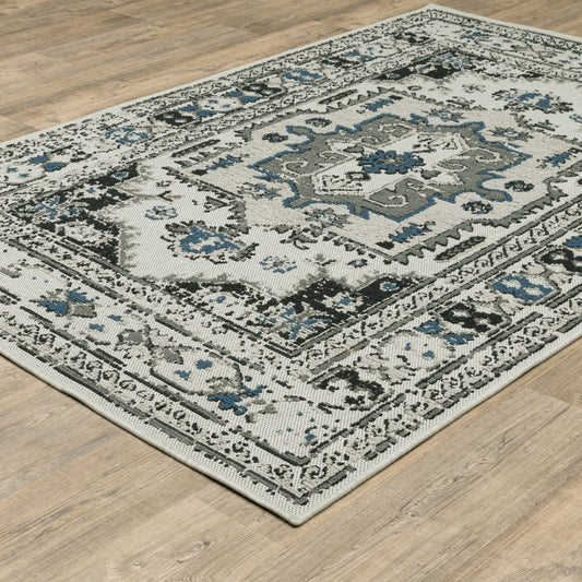 7' x 9' Blue and Beige Oriental Stain Resistant Indoor Outdoor Area Rug