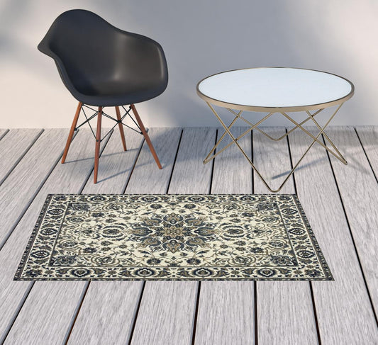 2' X 4' Ivory and Blue Oriental Stain Resistant Indoor Outdoor Area Rug