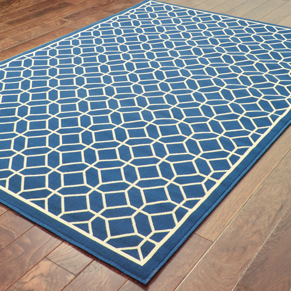 8' x 11' Blue and Ivory Geometric Stain Resistant Indoor Outdoor Area Rug