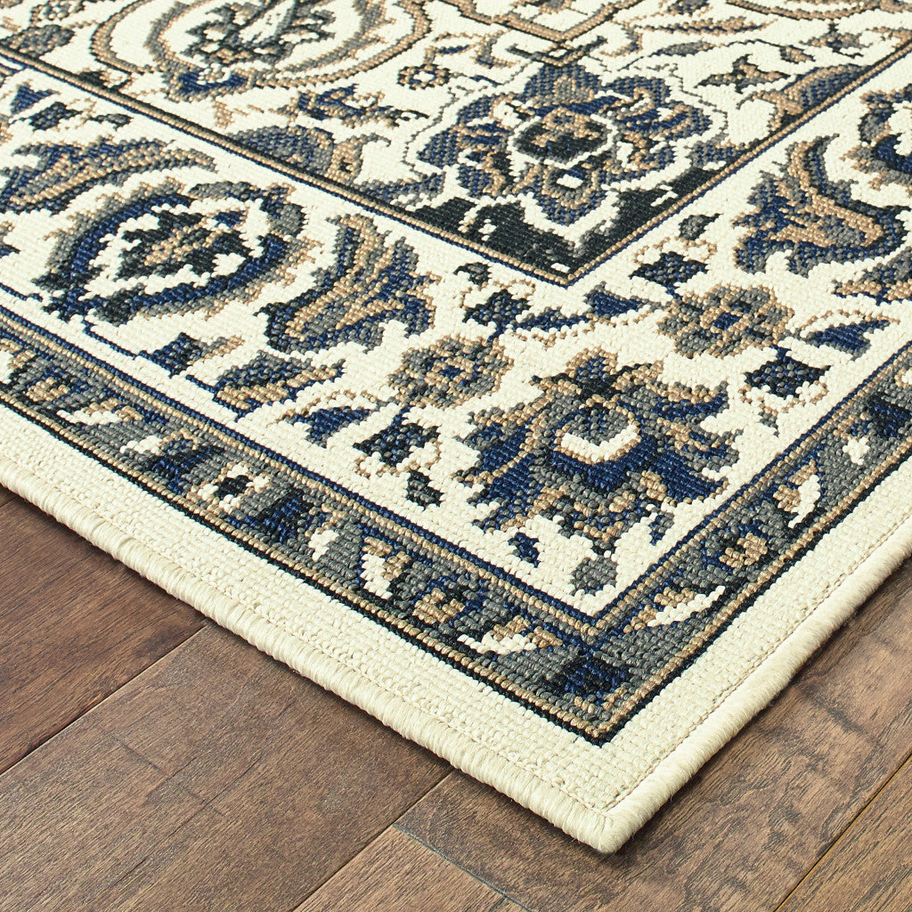 2' X 4' Ivory and Blue Oriental Stain Resistant Indoor Outdoor Area Rug