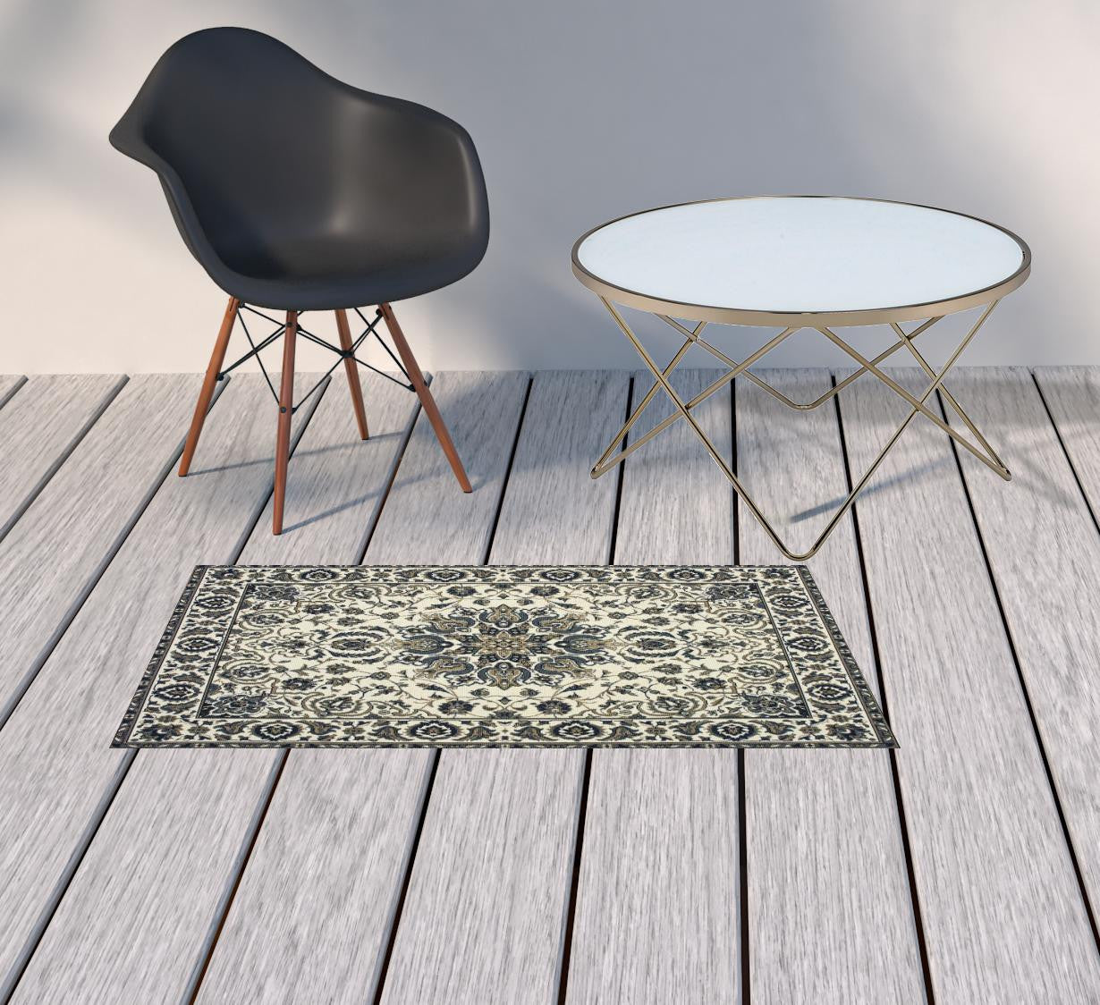 2' X 4' Ivory and Blue Oriental Stain Resistant Indoor Outdoor Area Rug