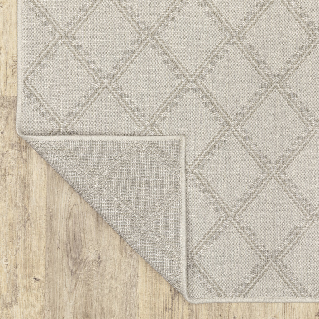 7' x 9' Gray and Ivory Geometric Stain Resistant Indoor Outdoor Area Rug