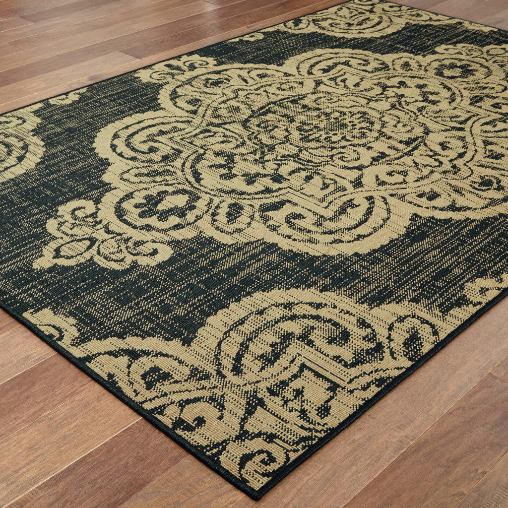 9' X 13' Black and Tan Oriental Stain Resistant Indoor Outdoor Area Rug