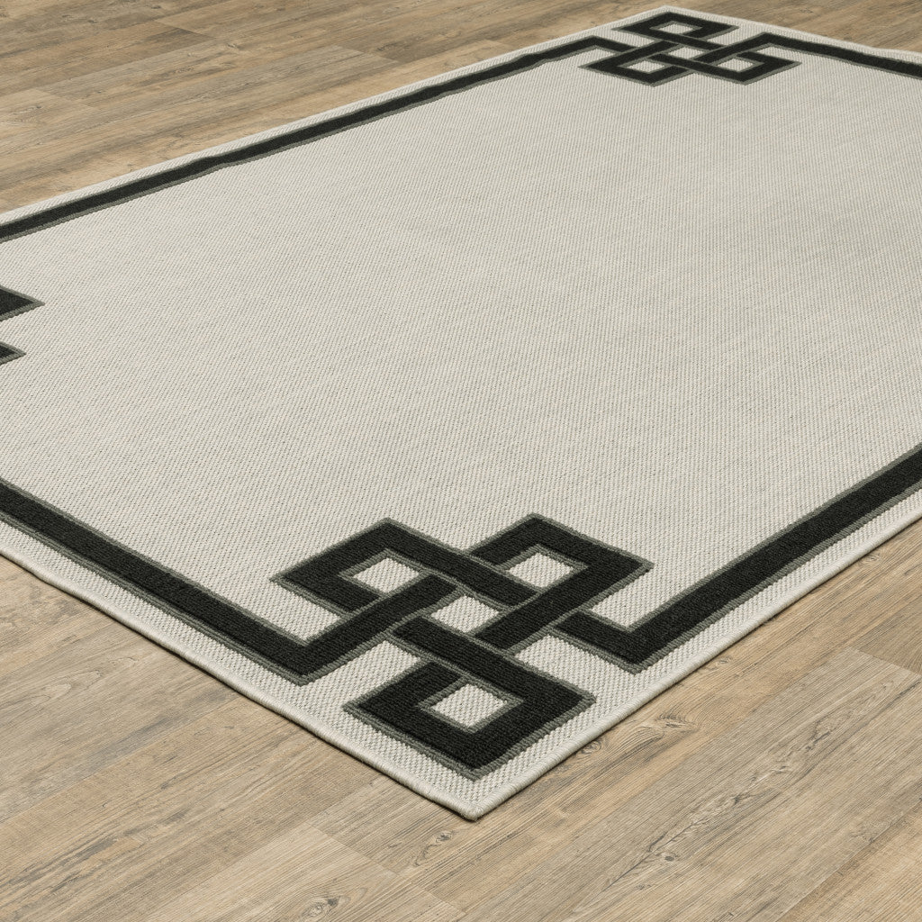 8' x 10' Beige and Black Stain Resistant Indoor Outdoor Area Rug