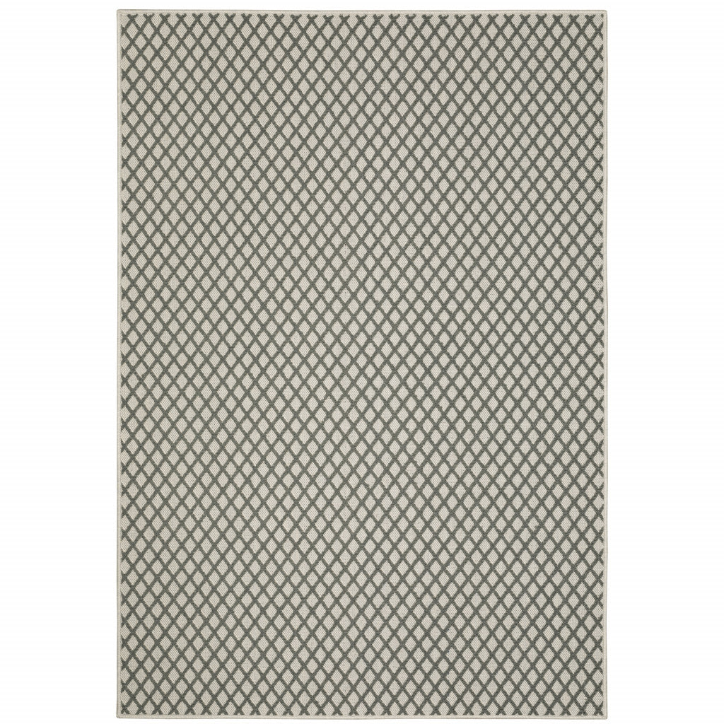 7' x 9' Beige Geometric Stain Resistant Indoor Outdoor Area Rug