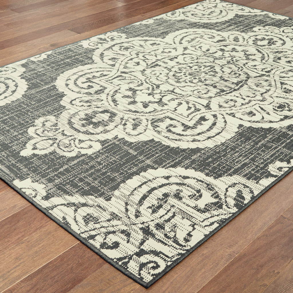 4' x 6' Gray and Ivory Oriental Stain Resistant Indoor Outdoor Area Rug