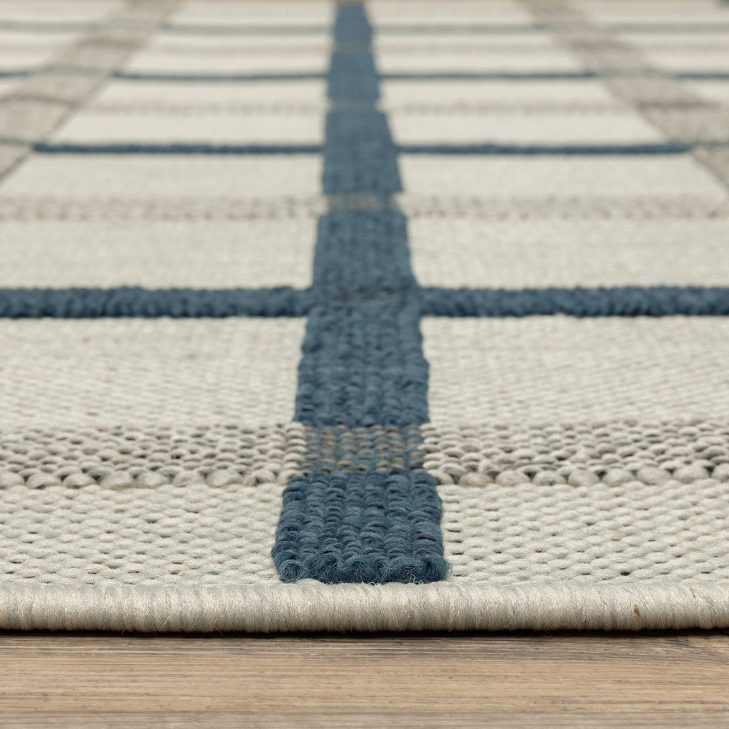 2' X 4' Blue and Beige Geometric Stain Resistant Indoor Outdoor Area Rug