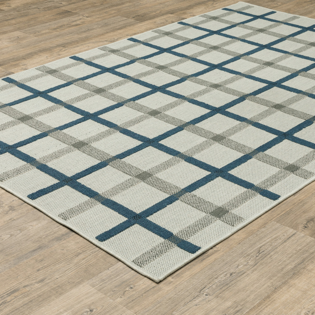 2' X 4' Blue and Beige Geometric Stain Resistant Indoor Outdoor Area Rug