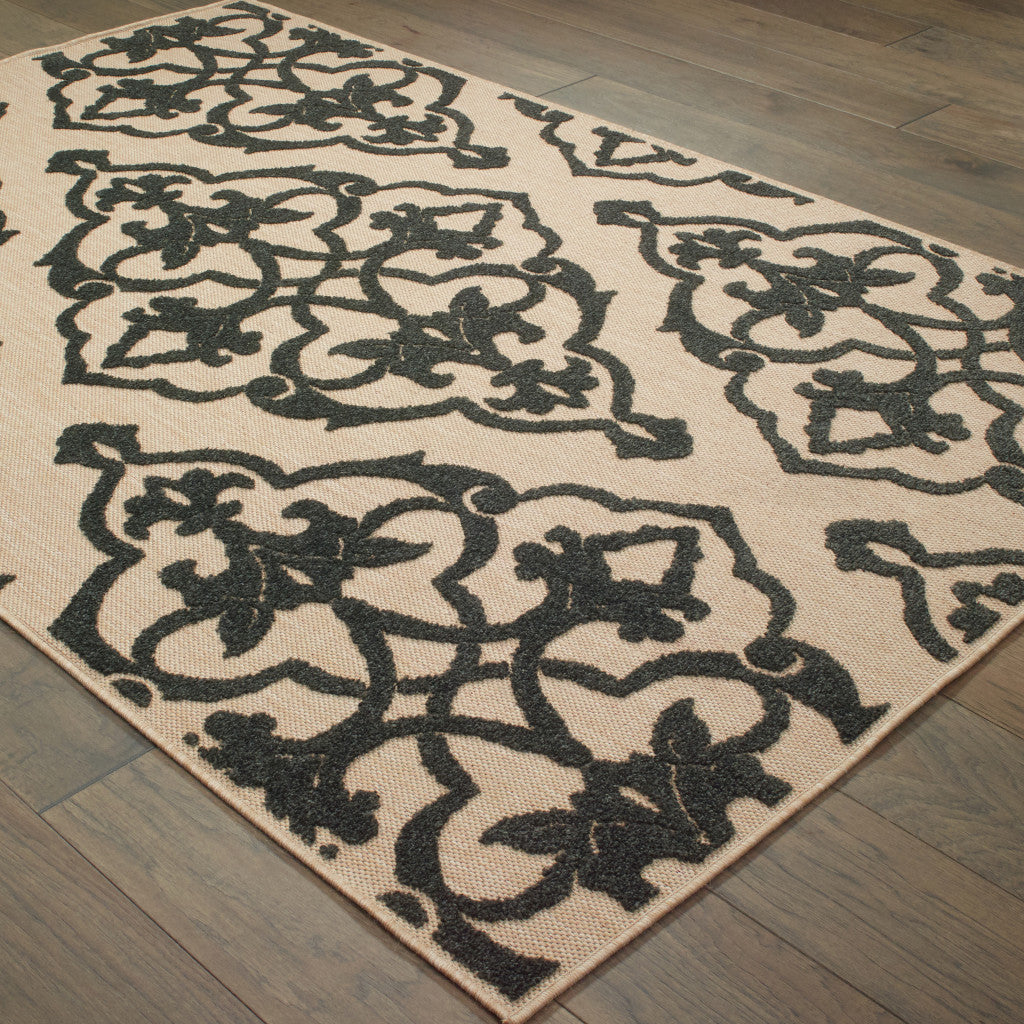 7' x 10' Beige and Black Oriental Stain Resistant Indoor Outdoor Area Rug