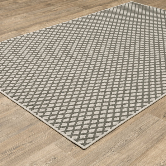 2' X 4' Beige Geometric Stain Resistant Indoor Outdoor Area Rug