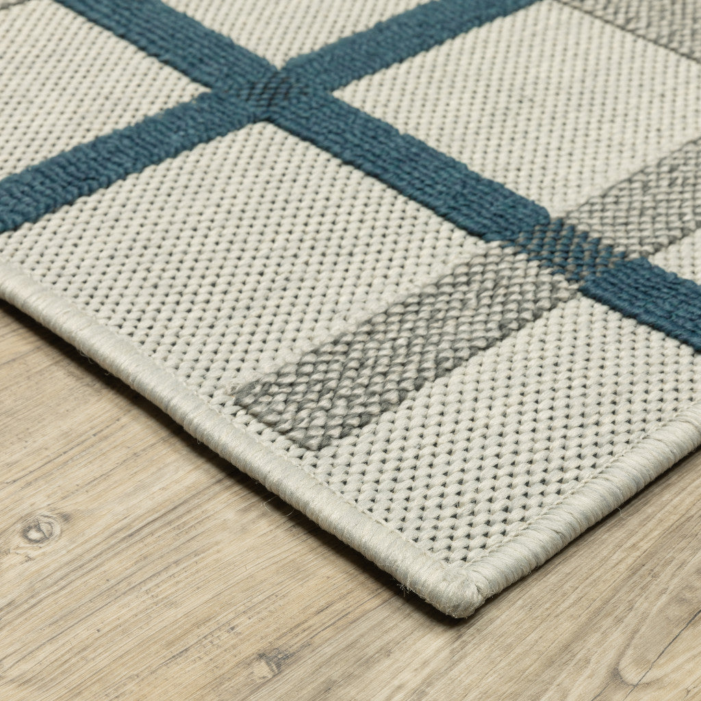 5' x 7' Blue and Beige Geometric Stain Resistant Indoor Outdoor Area Rug