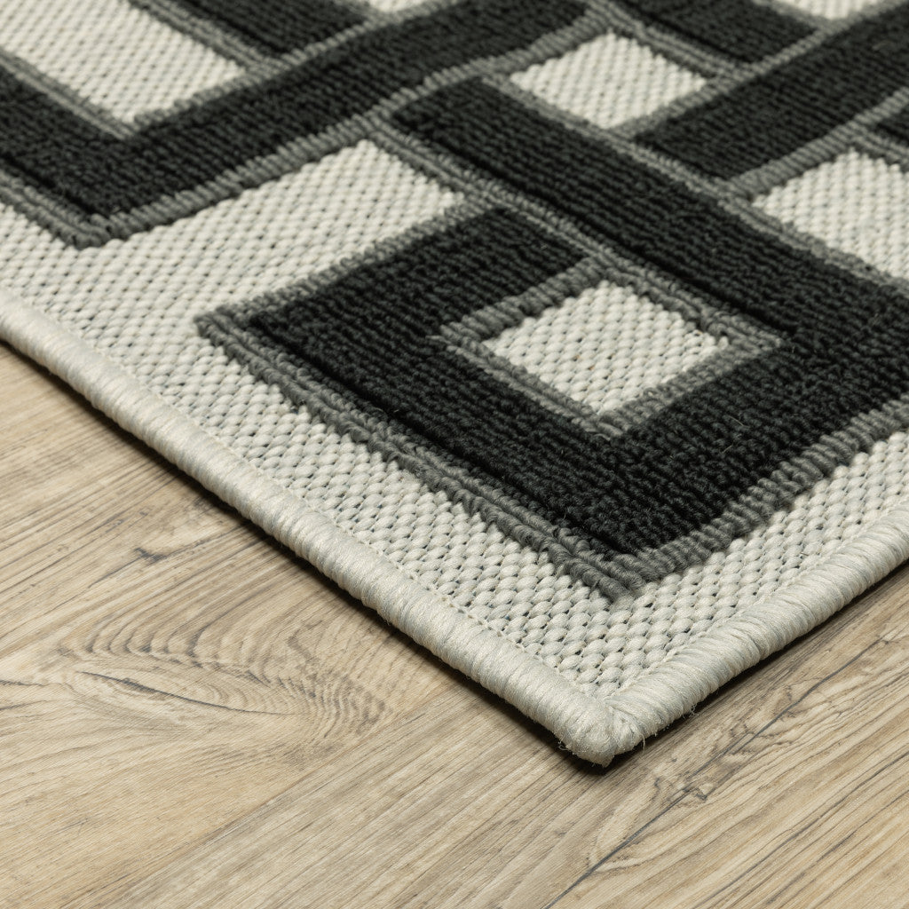 10' x 13' Beige and Black Stain Resistant Indoor Outdoor Area Rug