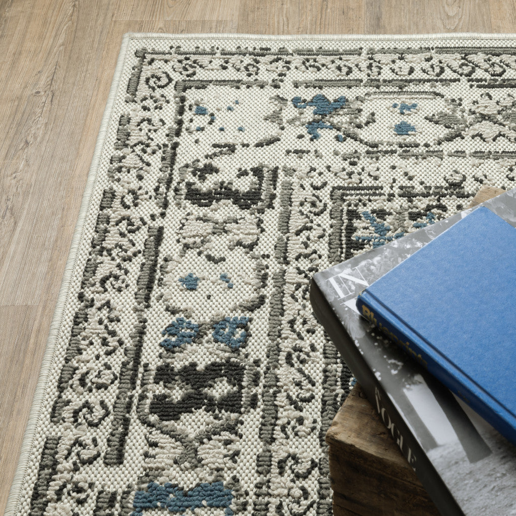 5' x 7' Blue and Beige Oriental Stain Resistant Indoor Outdoor Area Rug