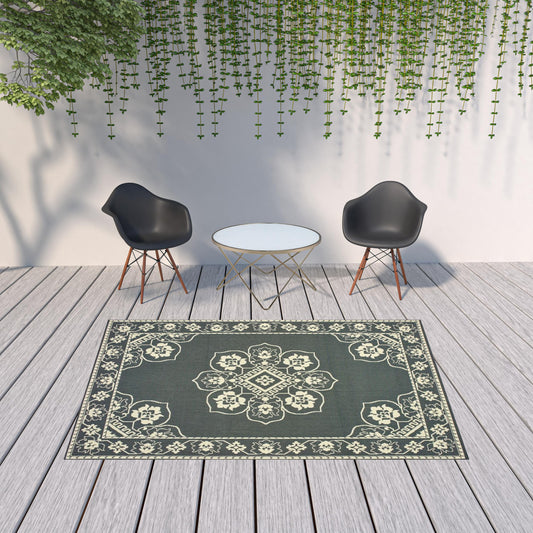 7' x 10' Gray and Ivory Oriental Stain Resistant Indoor Outdoor Area Rug