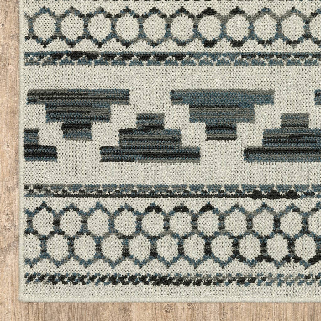 5' x 7' Blue and Beige Geometric Stain Resistant Indoor Outdoor Area Rug