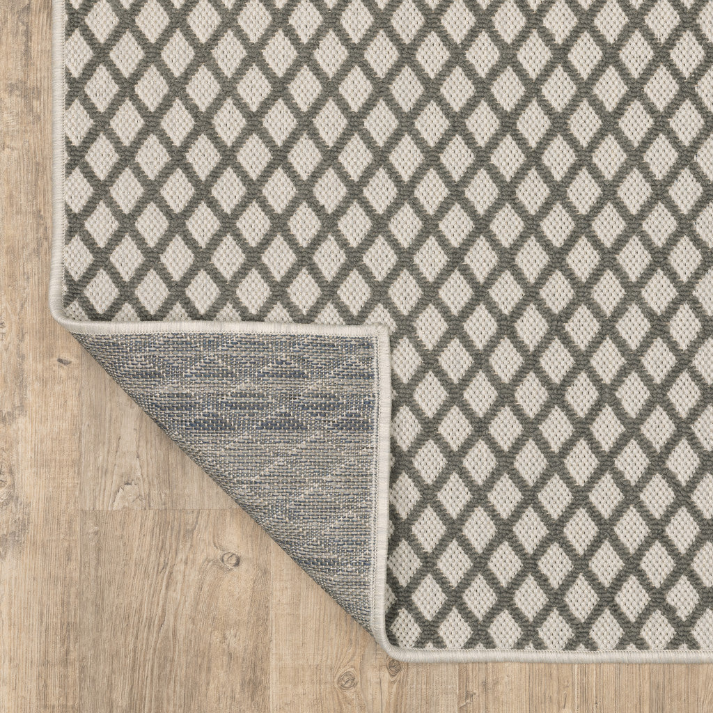 8' x 10' Beige Geometric Stain Resistant Indoor Outdoor Area Rug