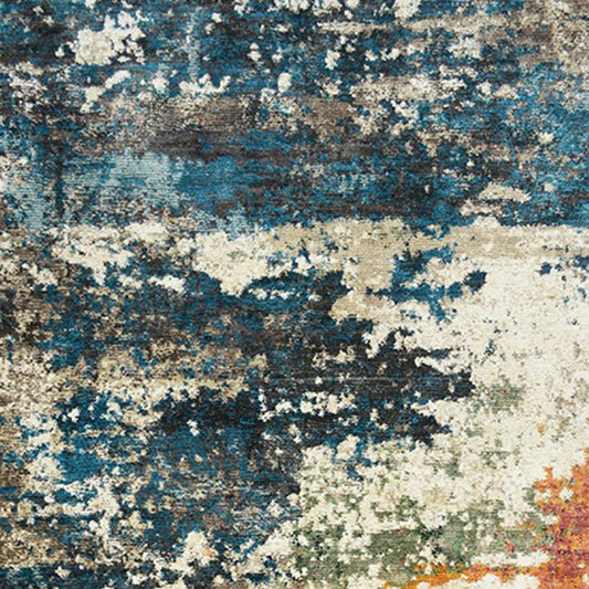 5' x 8' Beige Blue and Ivory Abstract Distressed Area Rug With Fringe
