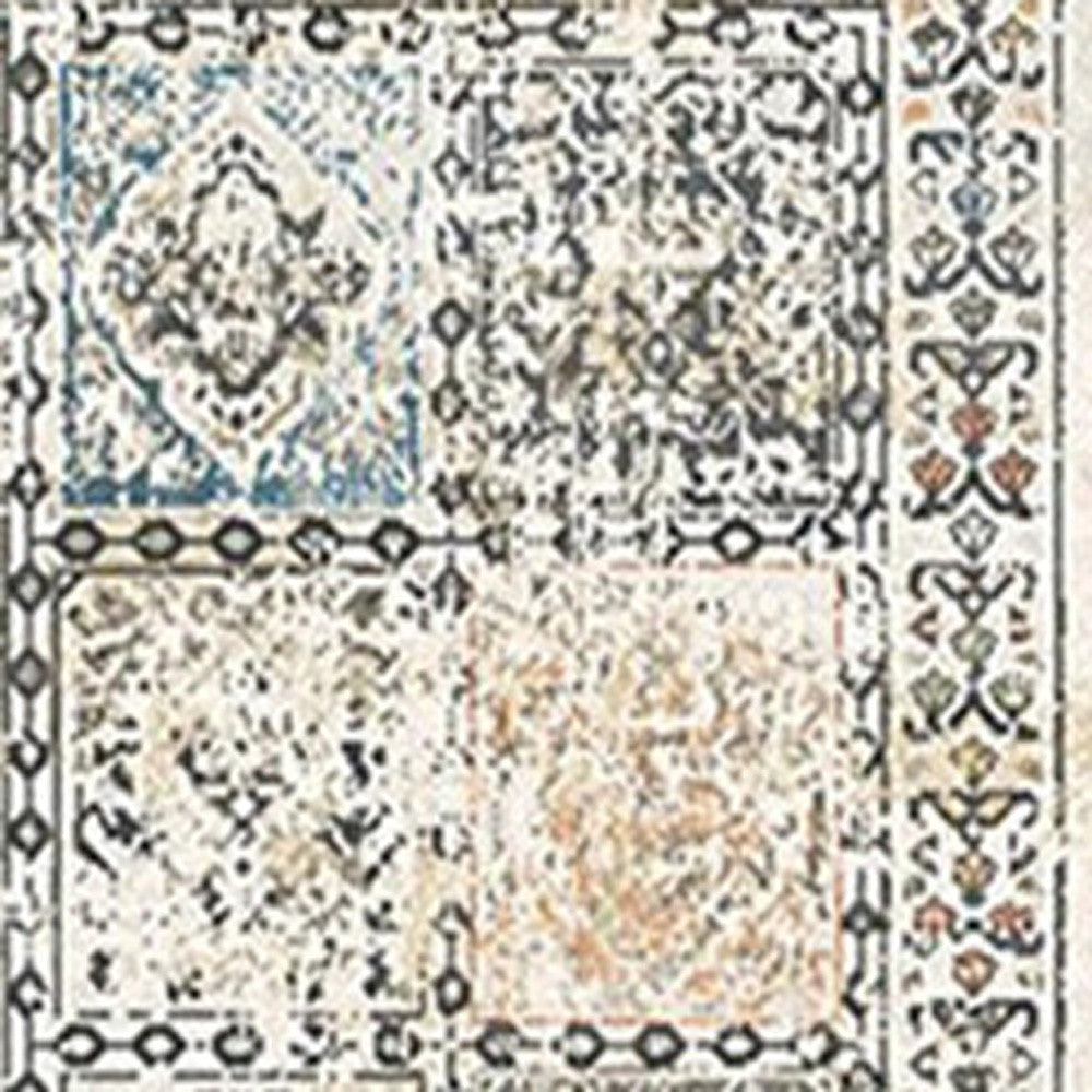 8' Ivory Blue and Gray Patchwork Distressed Runner Rug With Fringe