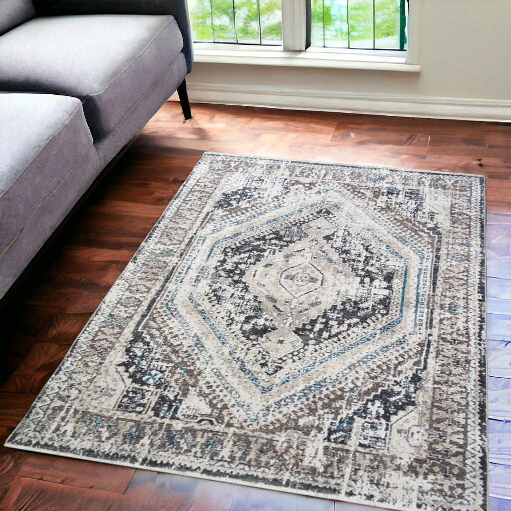 5' x 8' Gray Beige and Blue Geometric Distressed Area Rug With Fringe