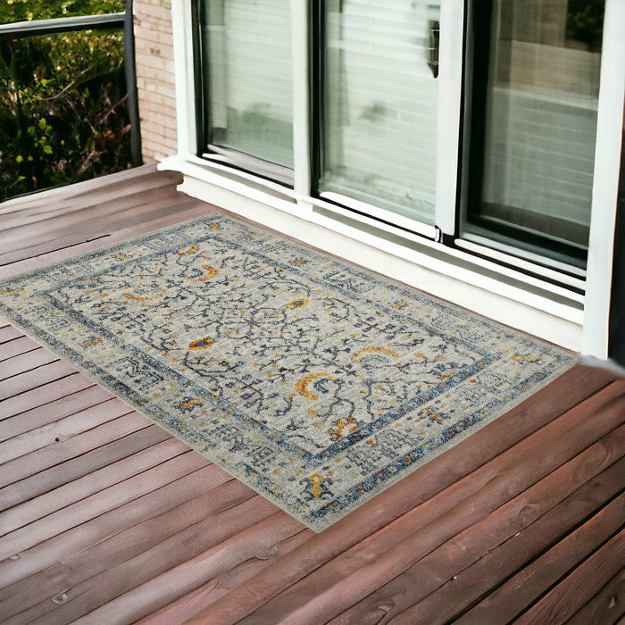 2' x 3' Yellow and Ivory Southwestern Stain Resistant Indoor Outdoor Area Rug