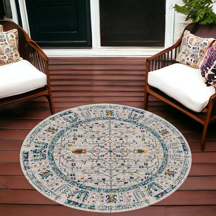 7' Round Yellow and Ivory Round Southwestern Stain Resistant Indoor Outdoor Area Rug