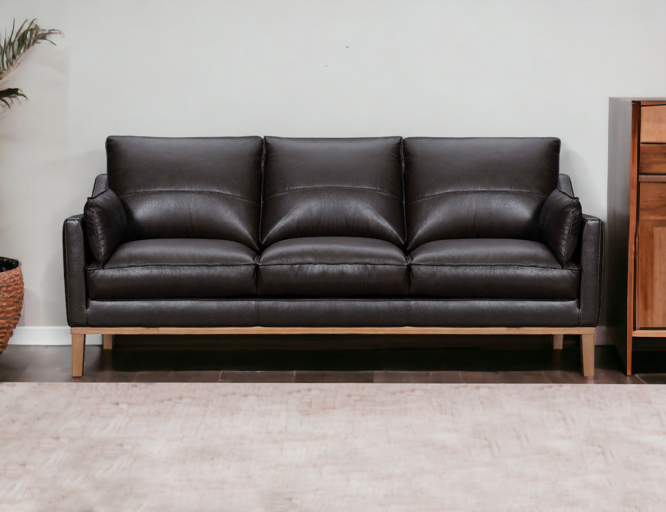 87" Dark Brown Leather Sofa And Toss Pillows