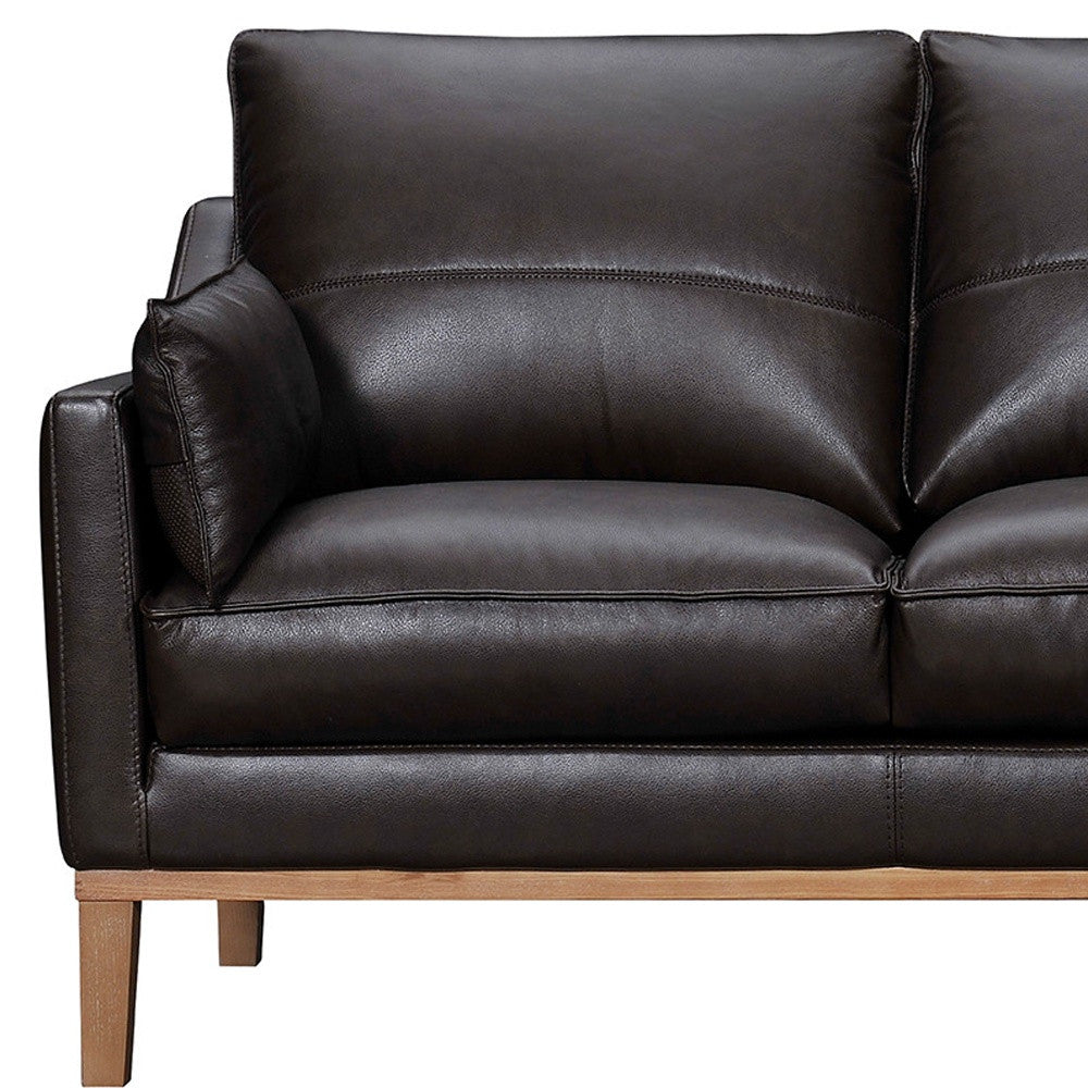 87" Dark Brown Leather Sofa And Toss Pillows