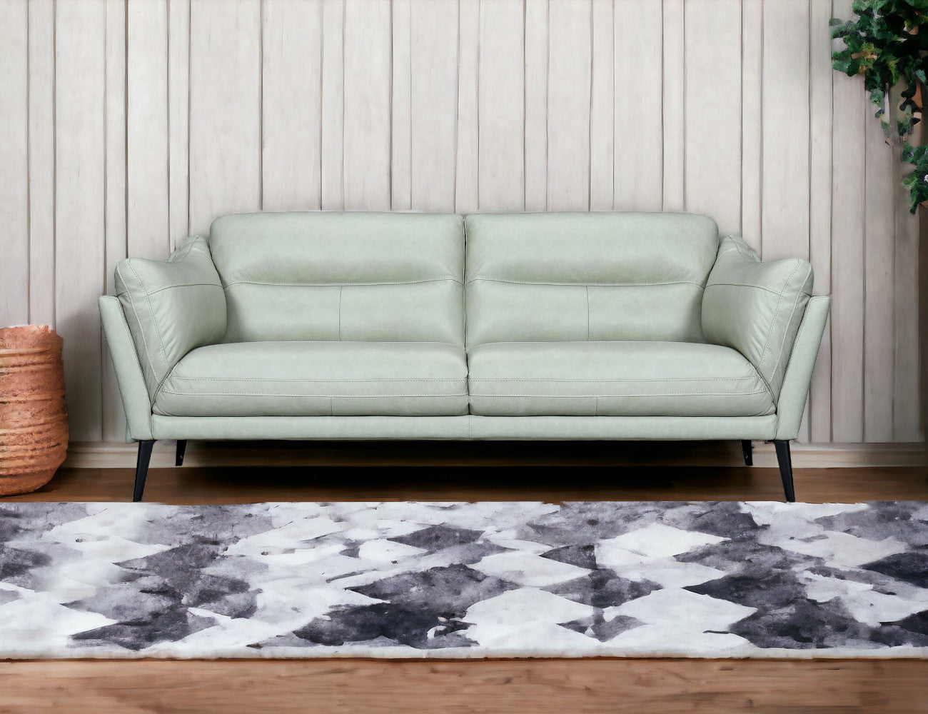 87" Mint Green And Black Leather Sofa