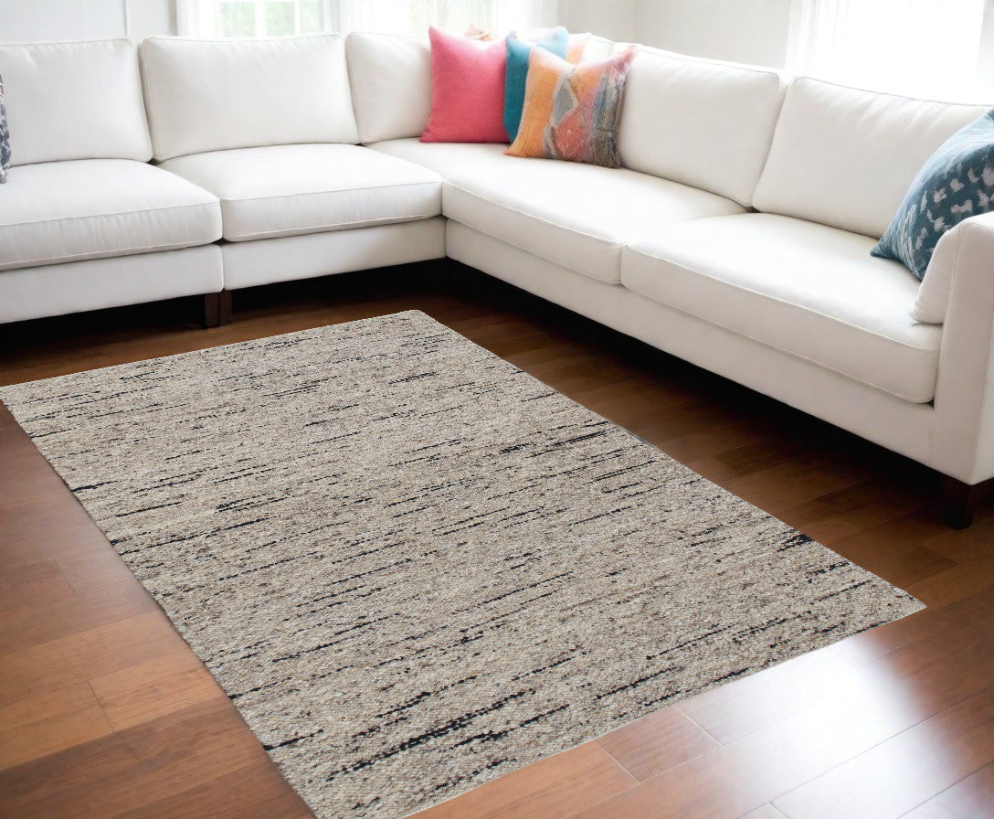 9' x 12' Beige and Black Abstract Hand Woven Area Rug